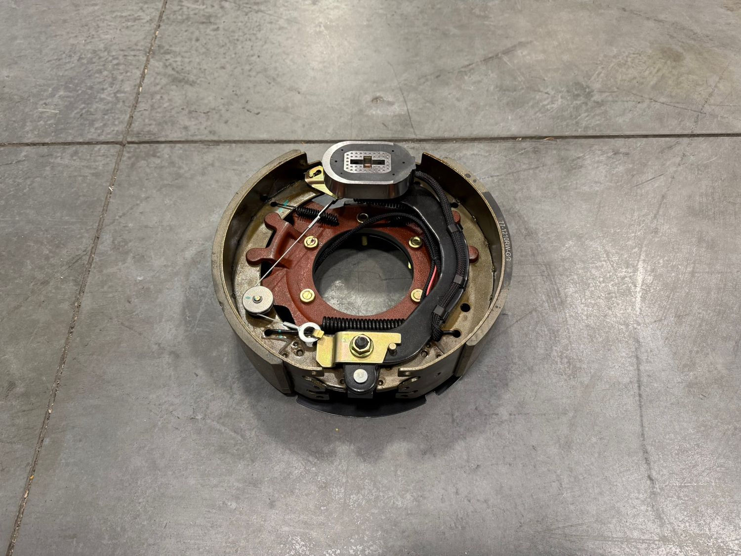 Rockwell version 12-1/4 inch electric brake for 10,000-lb axles, left hand, 3-3/8", 5 holes,