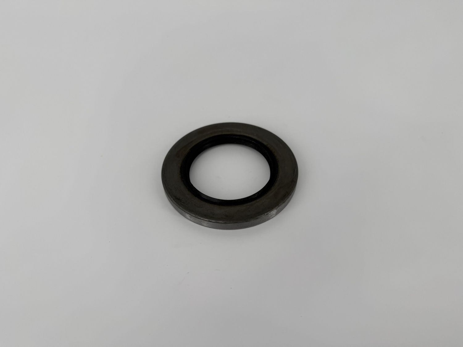 10-10 GREASE SEAL 2.125" ID X 3.376" OD ( DEXTER 010-010-00 )