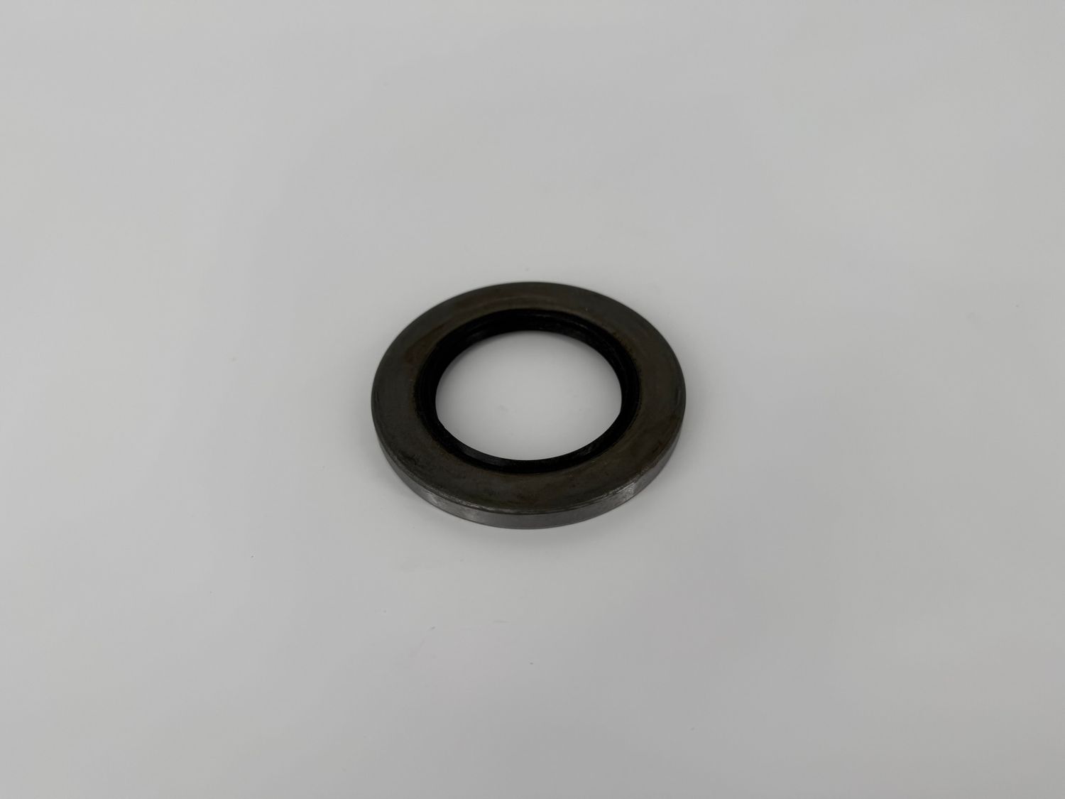 10-10 GREASE SEAL 2.125" ID X 3.376" OD ( DEXTER 010-010-00 )