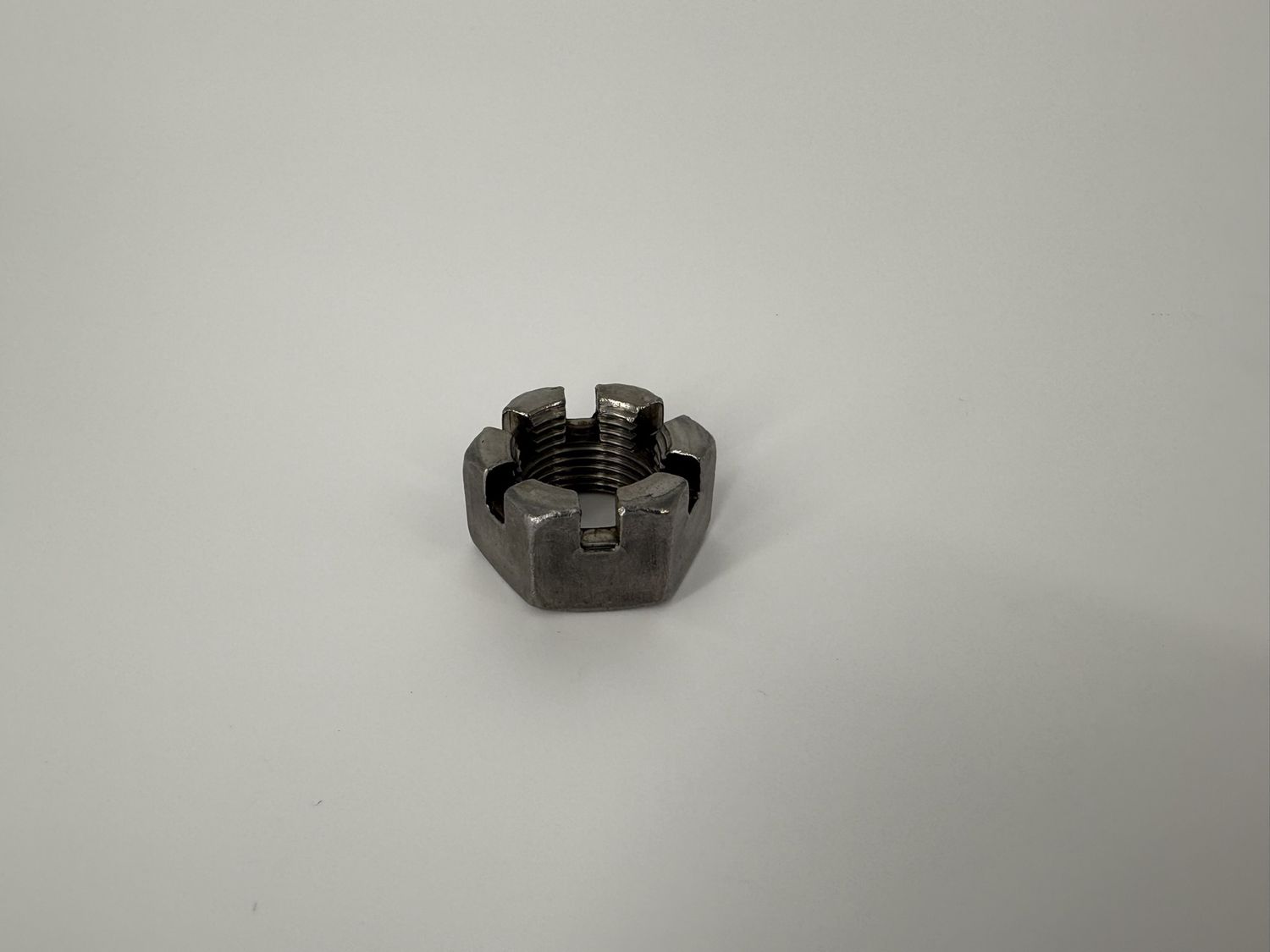 1"-14 6 SLOT HEX SPINDLE NUT ( 006-001-00)