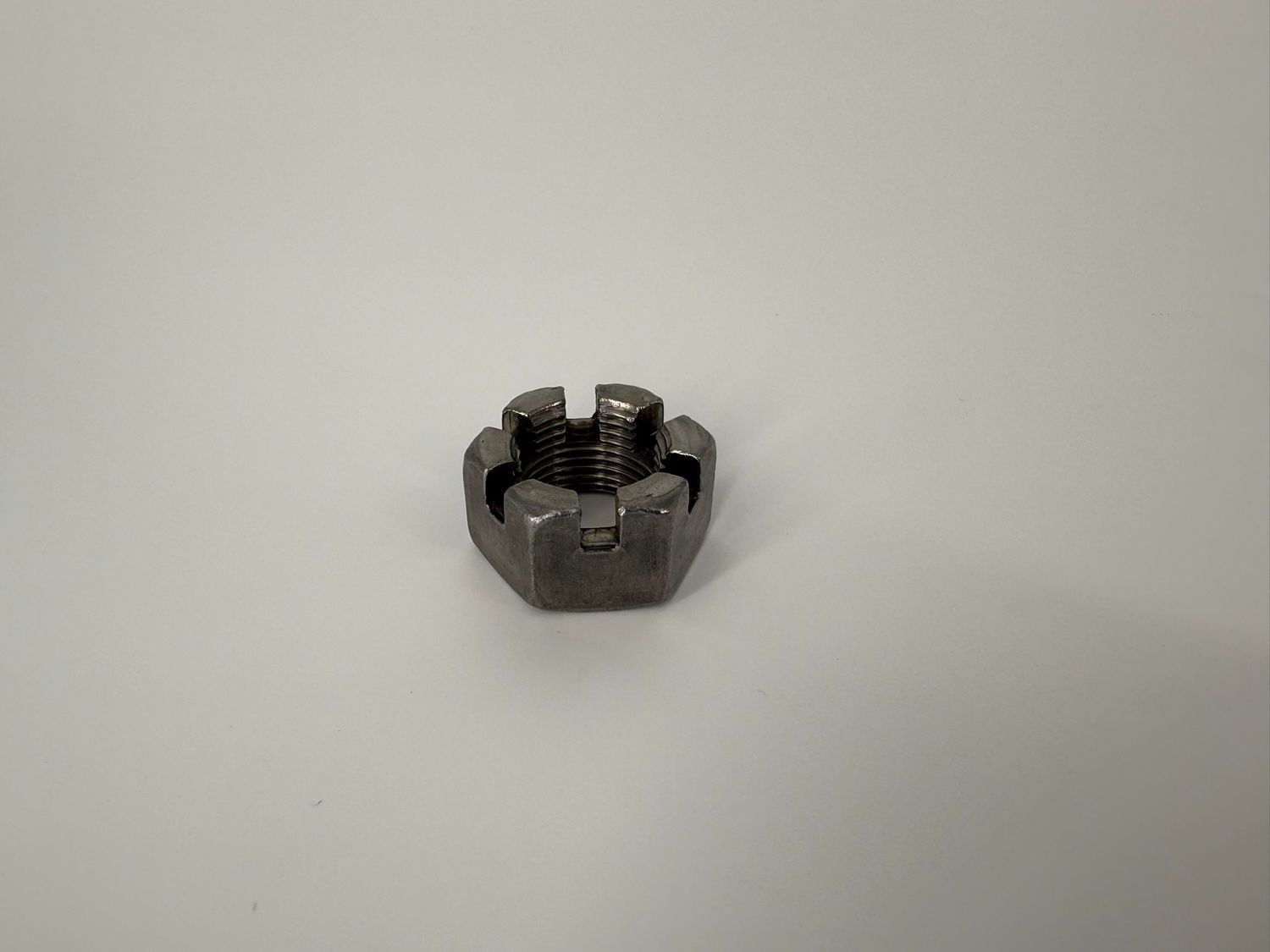 1"-14 6 SLOT HEX SPINDLE NUT ( 006-001-00)