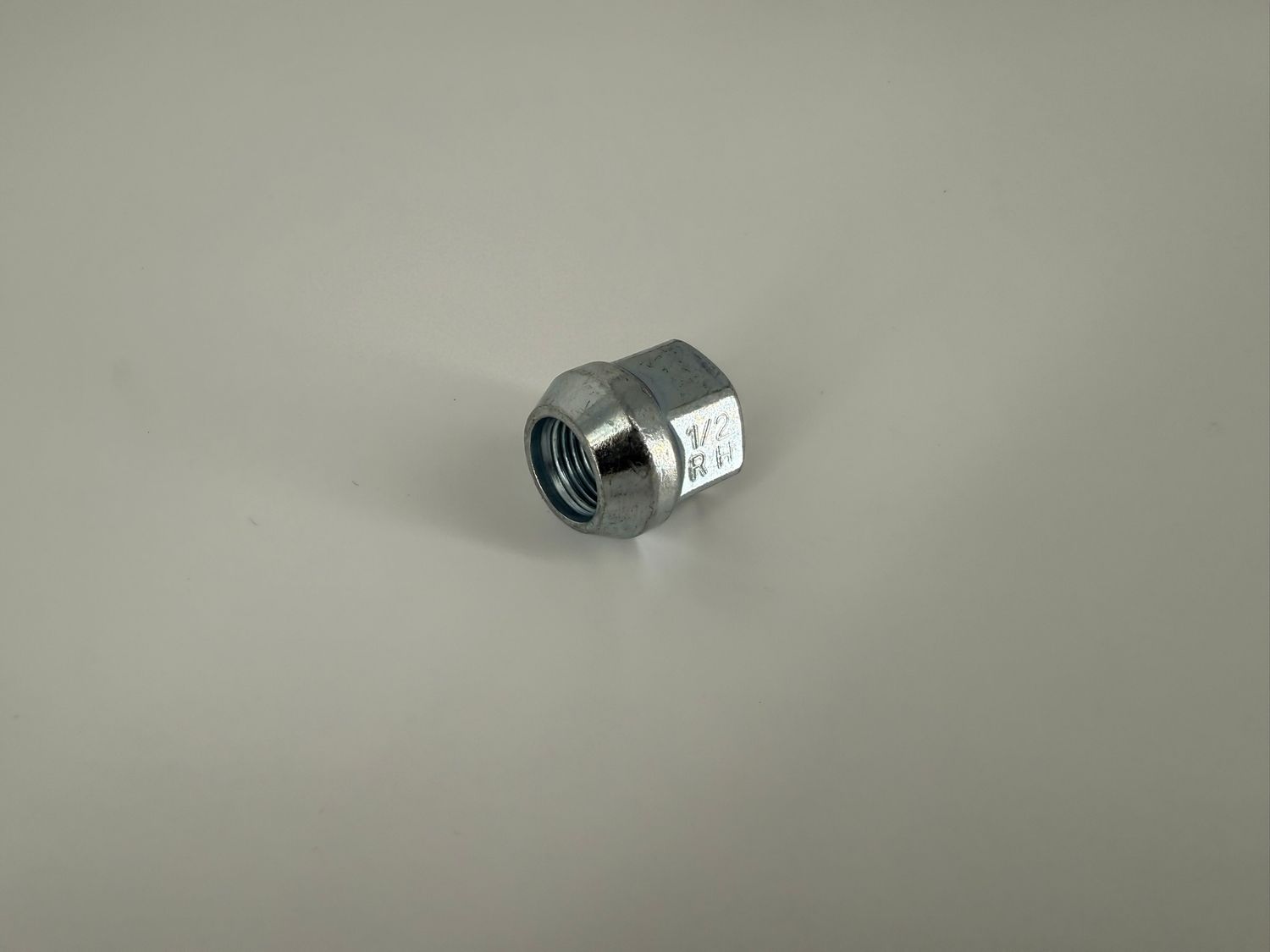 ZINC ACORN OPEN NUT 9/16"-18 .83" TALL 3/4" HEX