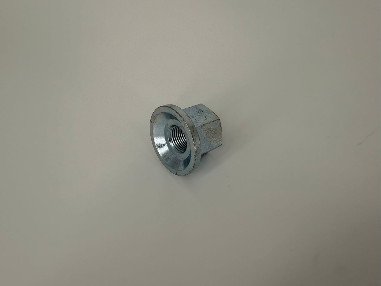 LUG NUT 5/8"-18 SOLID FLANGED