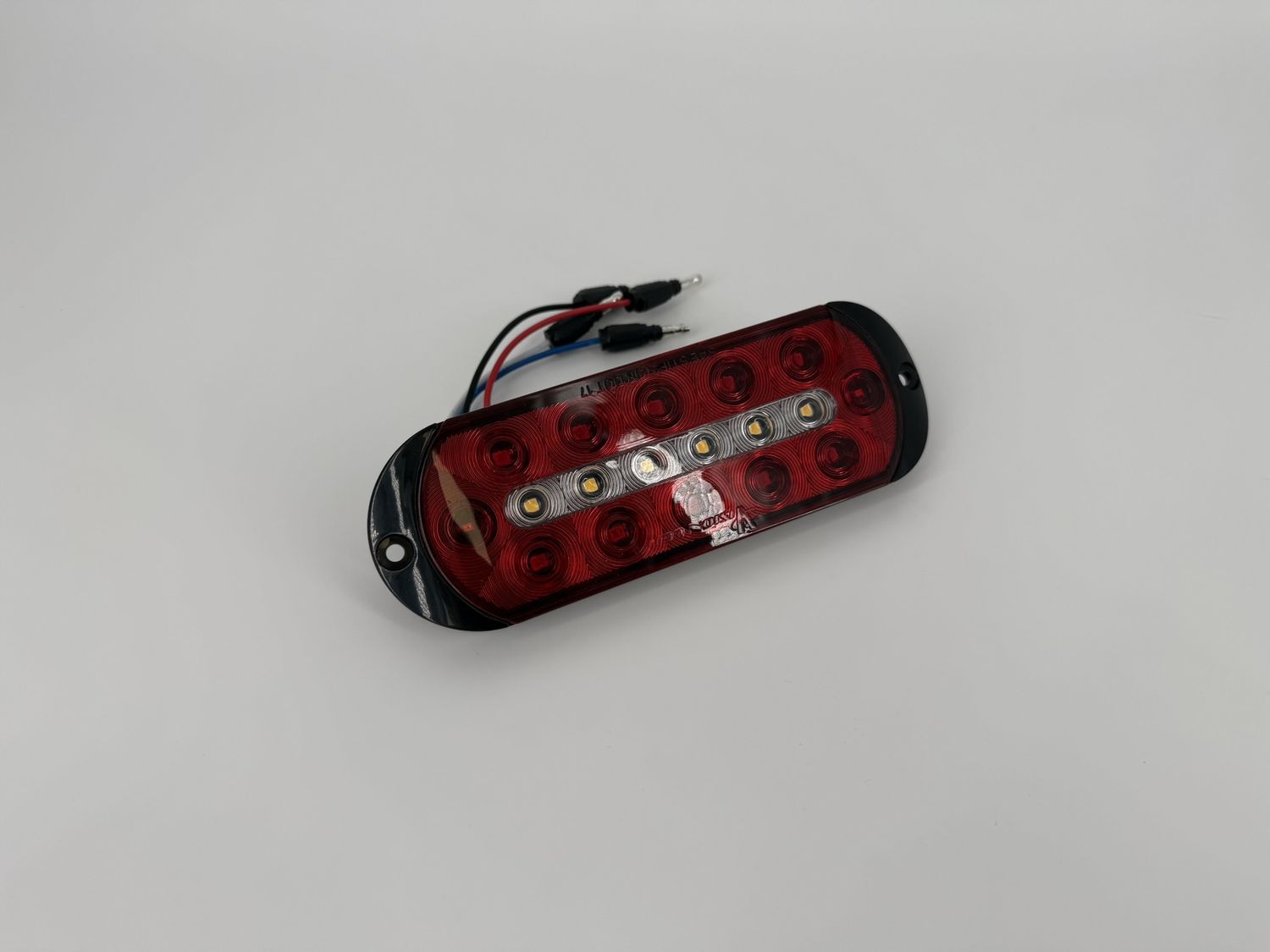 6" OVAL LED SURFACE MOUNT S/T/T RED WITH REVERSE LIGHT