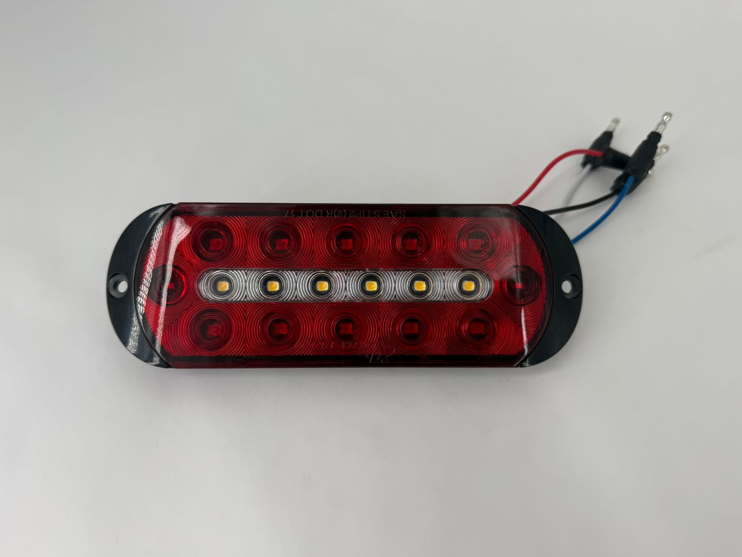 6" OVAL LED SURFACE MOUNT S/T/T RED WITH REVERSE LIGHT