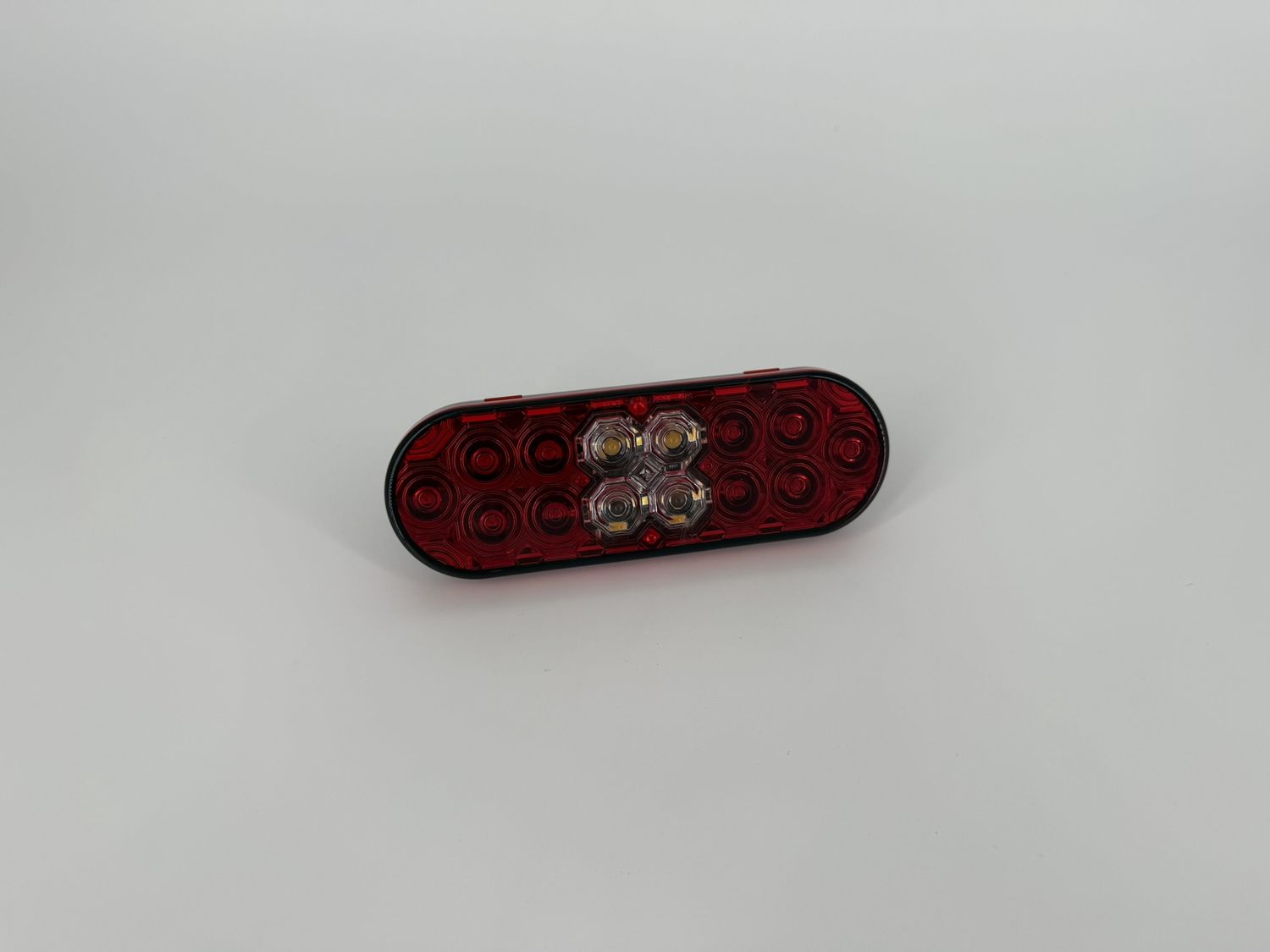 6" OVAL LED S/T/T RED WITH INTEGRATED BACK UP
