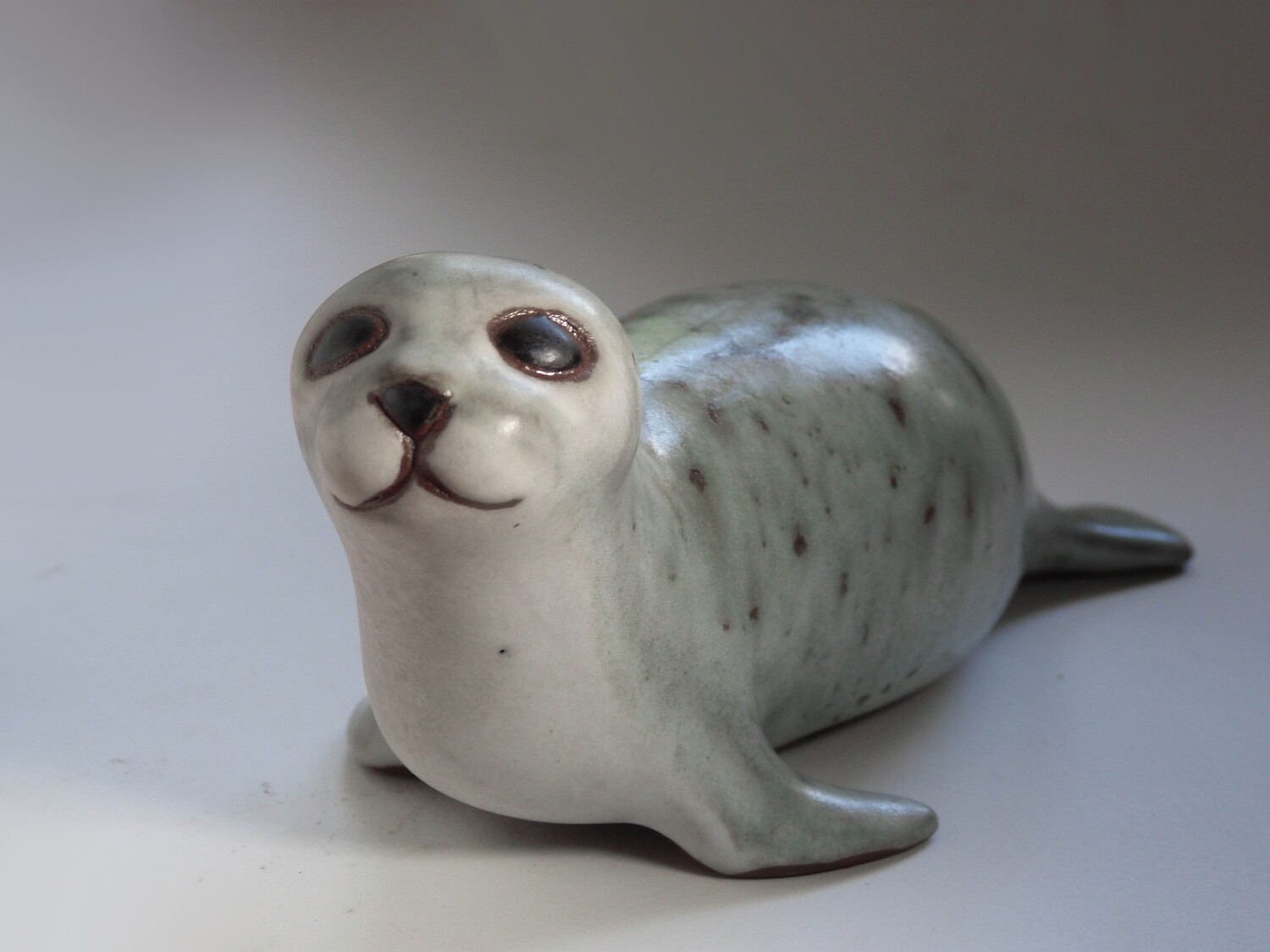 Baby Seal, early vintage, Grey with breaking bronze polkadots