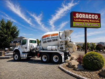 Soracco short load ready mix truck beside the red Open To The Public sign at the Yakima yard.