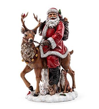 Santa Riding Reindeer Figurine