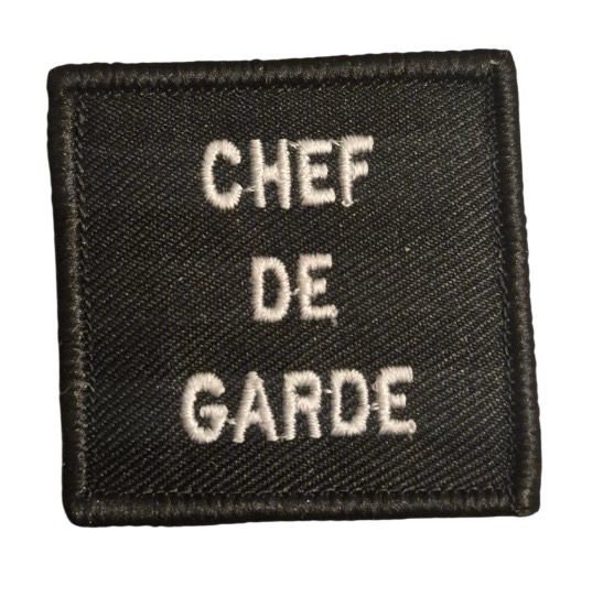 Grade / galon CHEF DE GARDE SSLIA / Pompiers d’aéroport - broderie blanc sur tissu noir avec support auto-agrippant BG-SAFETY