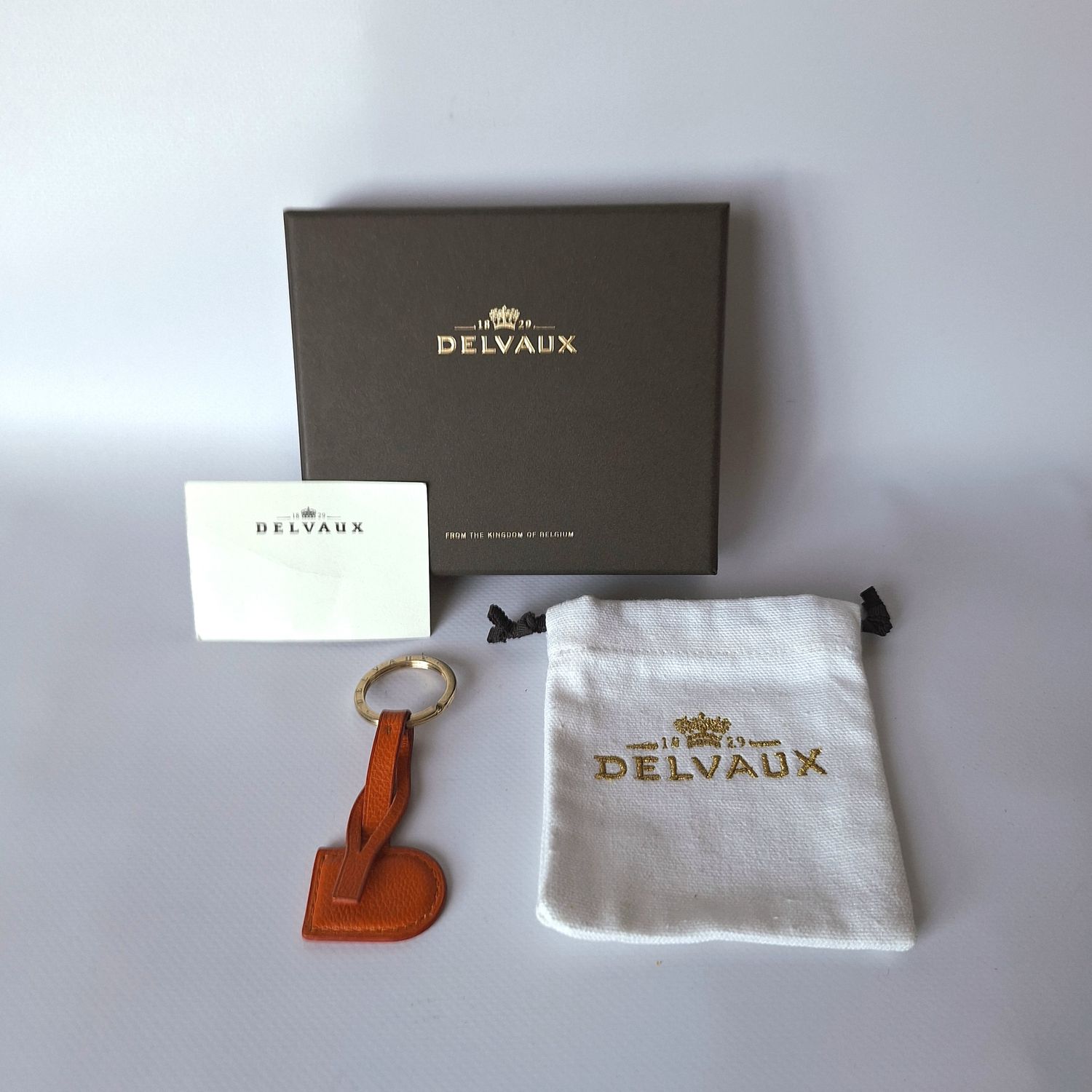 DELVAUX oranje sleutelhanger FULL-SET