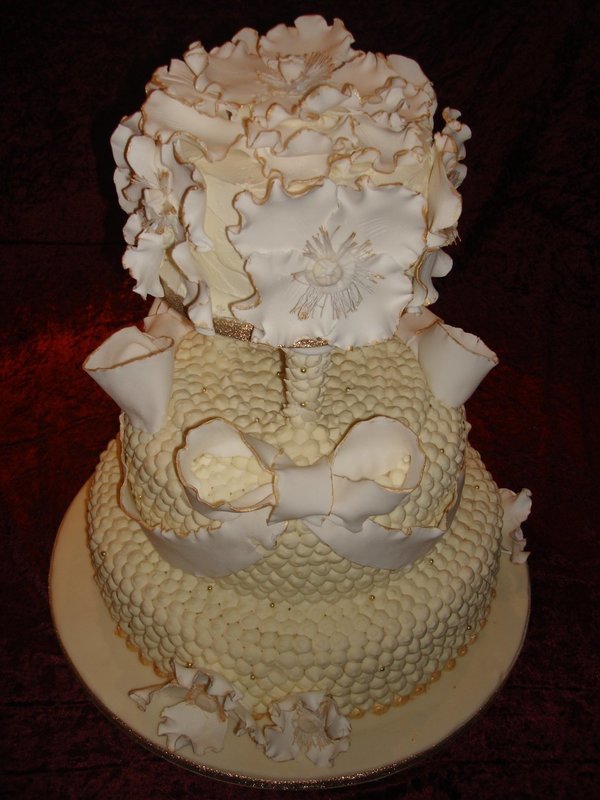 A Ivory Handcrafted Piped, Bow & Flower Wedding Cake
