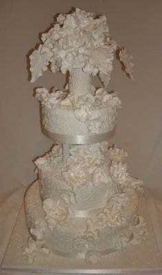 A Ivory and Handcraft Flower Wedding Cake