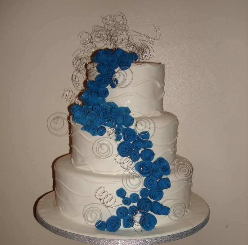 Curls and Blue Roses  Wedding Cake