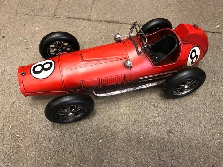 Tin vintage red racing car