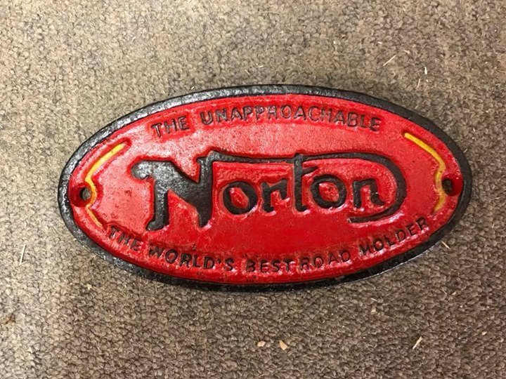Norton Motorcycles red cast plaque