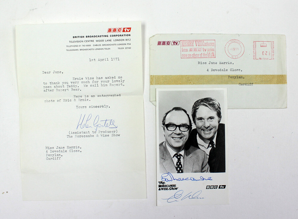 An Original Signed BBC Photo Card by Comedians Eric Morecambe and Ernie Wise. Also includes a BBC Typed Letter on the Behalf of Ernie Wise