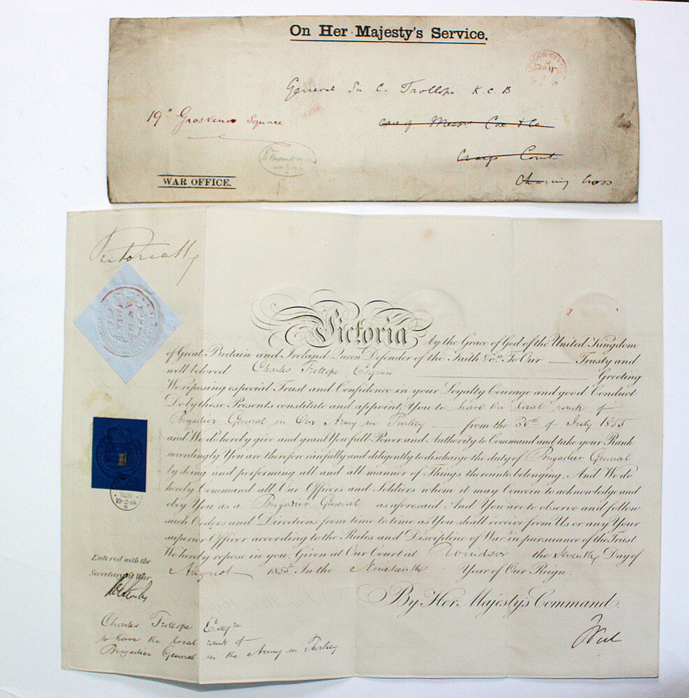 An Original Military Commission and Later Envelope for the Promotion to Brigadier General for Our Army in Turkey for Sir Charles Trollope. Dated 1855 and signed by Queen Victoria