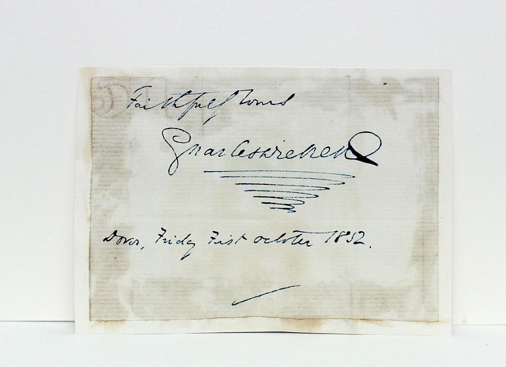 An Original Handwritten and Signed Paper Slip from Writer Charles Dickens.