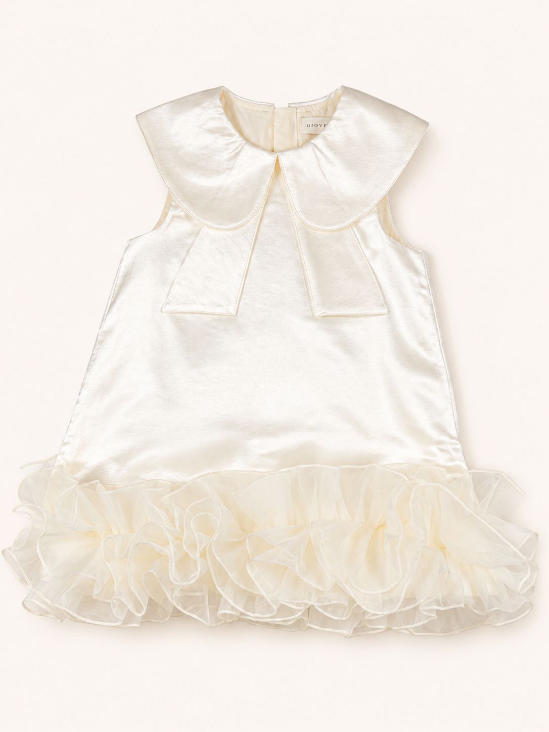 The Elara Organza Ruffle Occasion Dress in ivory with a rounded collar and organza ruffle hem