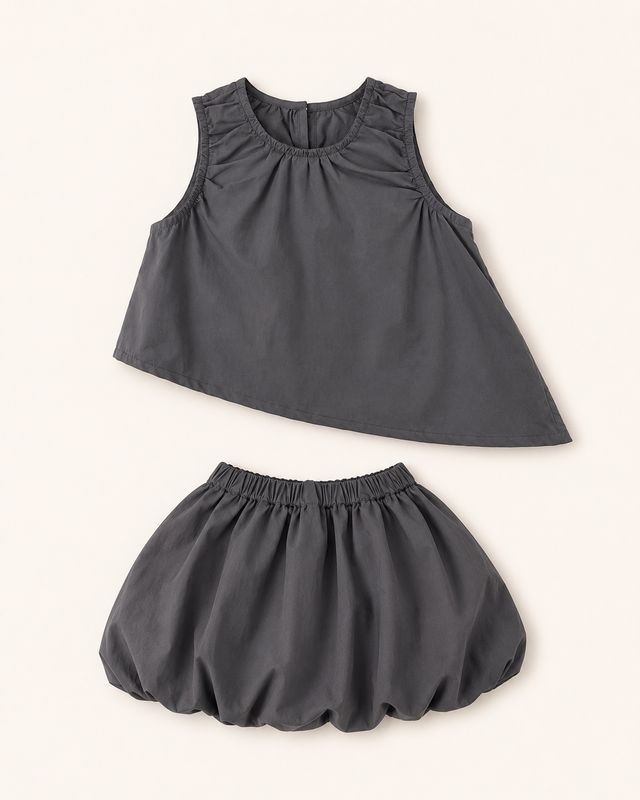 Charcoal girls’ set with asymmetric sleeveless top and rounded bubble skirt