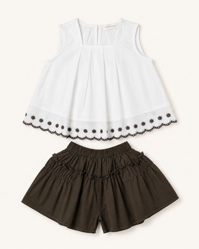 White embroidered girls’ blouse with coffee-brown skirt-style shorts and gathered ruffle detail