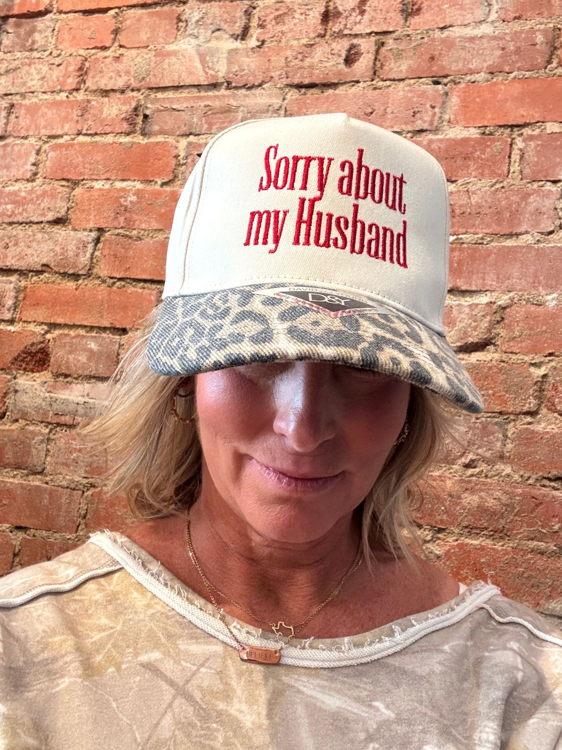 SORRY ABOUT MY HUSBAND TRUCKER HAT
