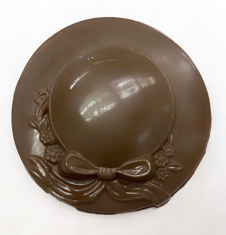 Solid Chocolate Ribbon Hat. Very fancy favor and unique. Gluten and Peanut Free. Homemade at Carella's Chocolates. Quantity discounts available. Call us. 609-586-5136 Solid Chocolate Ribbon Hat. Very fancy favor and unique. Gluten and Peanut Free. Homemade at Carella's Chocolates. Quantity discounts available. Call us. 609-586-5136