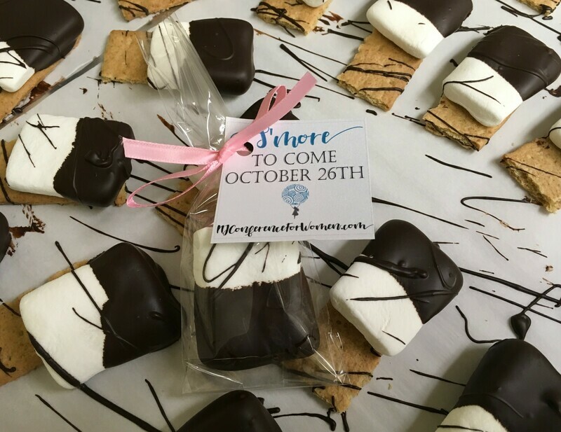 Smore's Favor for any Occasion!  Your choice of ribbon.  Flat Marshmallow covered in Dark Chocolate on a Graham. Tag is extra $12.00 per 25 or bring us your own tag and we will attach it no charge.