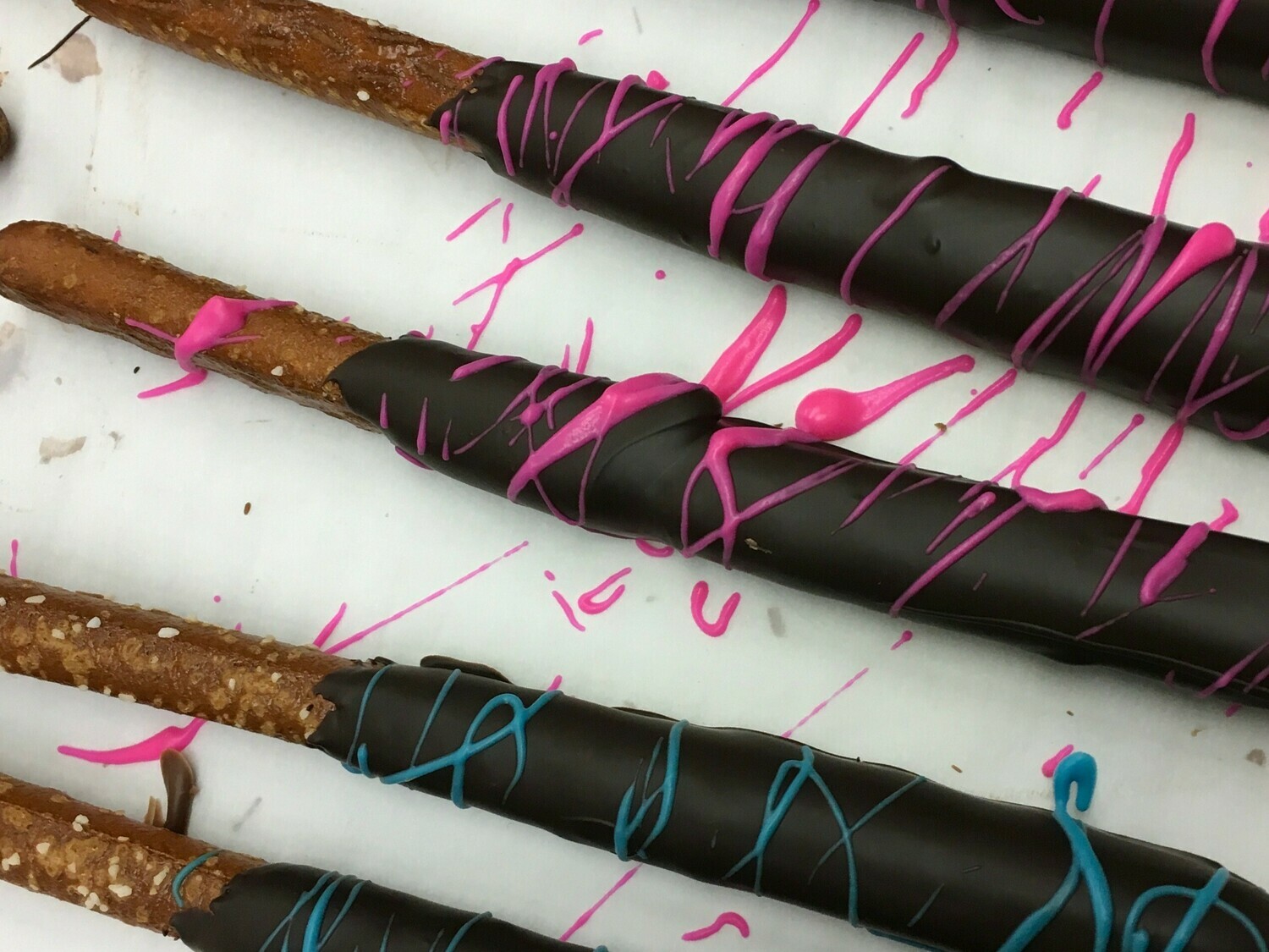 2 Pretzel Rods bagged and bowed.  Pink or Blue.