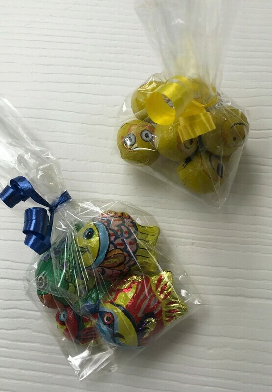 Kids favors.  Solid Milk Chocolate Emoji's,Solid Milk Chocolate Fish, with ribbon color of your choice.