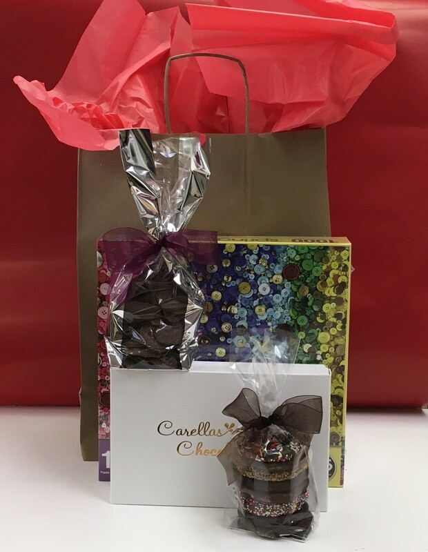 Drive up Package #1 - 1,000 piece puzzle, 2lb box of Assorted Chocolates, Choc Cov'd Potato Chips and 3 Ring Gourmet Pretzels.  Order and pick up at store or have it delivered! Puzzle design may vary.