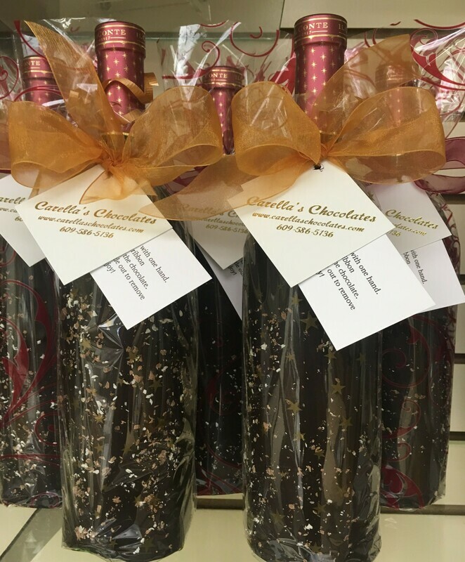 Must bring in your bottle and we will dip and decorate. $30.00 Per Bottle. Cannot Order Online.