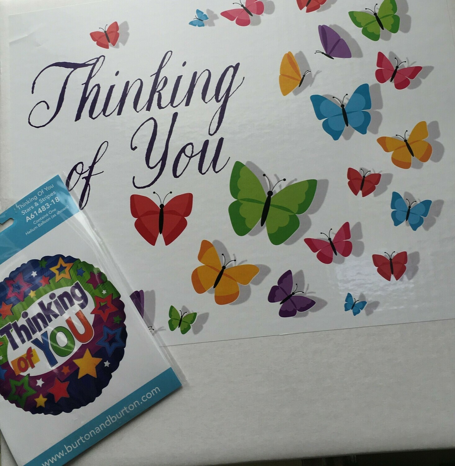 Thinking of you Balloon in a Box.  Add Some Chocolates.