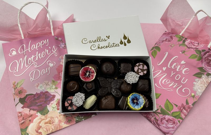 Over Half a Pound of Chocolates, Bag and Tissue Included.  Great Value for Mothers Day.  Limited Supply, order Today! Pick up at store only!