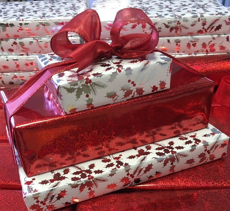 3 Tiered Assortment, 1 Lb. Assorted Chocolates, 1.25 lb. 3 Ring Gourmet Pretzels, 1/2 lb. Assorted Truffles.