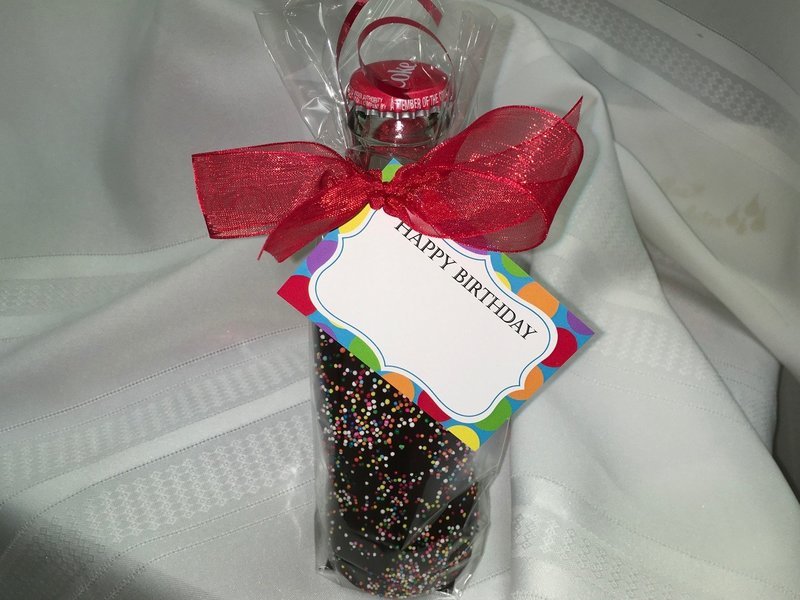 Chocolate Covered 8 ounce Beverage.  Easy Chocolate Removal.  Hand dipped in our Chocolate Kettle. Tag included.
