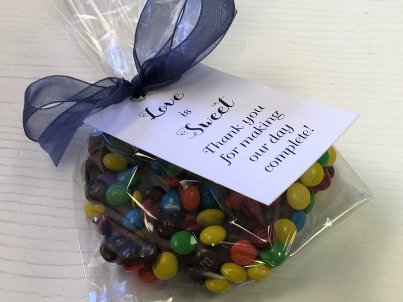 M&amp;M 3 Ring  Gourmet Pretzel Favor.  Please chose ribbon color.  Tag is 112.50 extra per 25.  5 day pre orders over 50