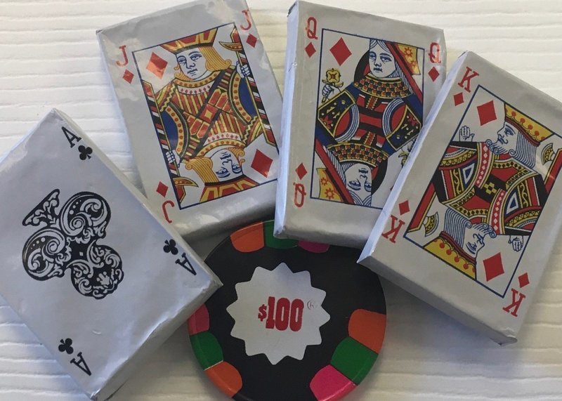 Milk Chocolate Mint Cards and Solid Chocolate Roulette Chips. (may contain traces of peanuts)