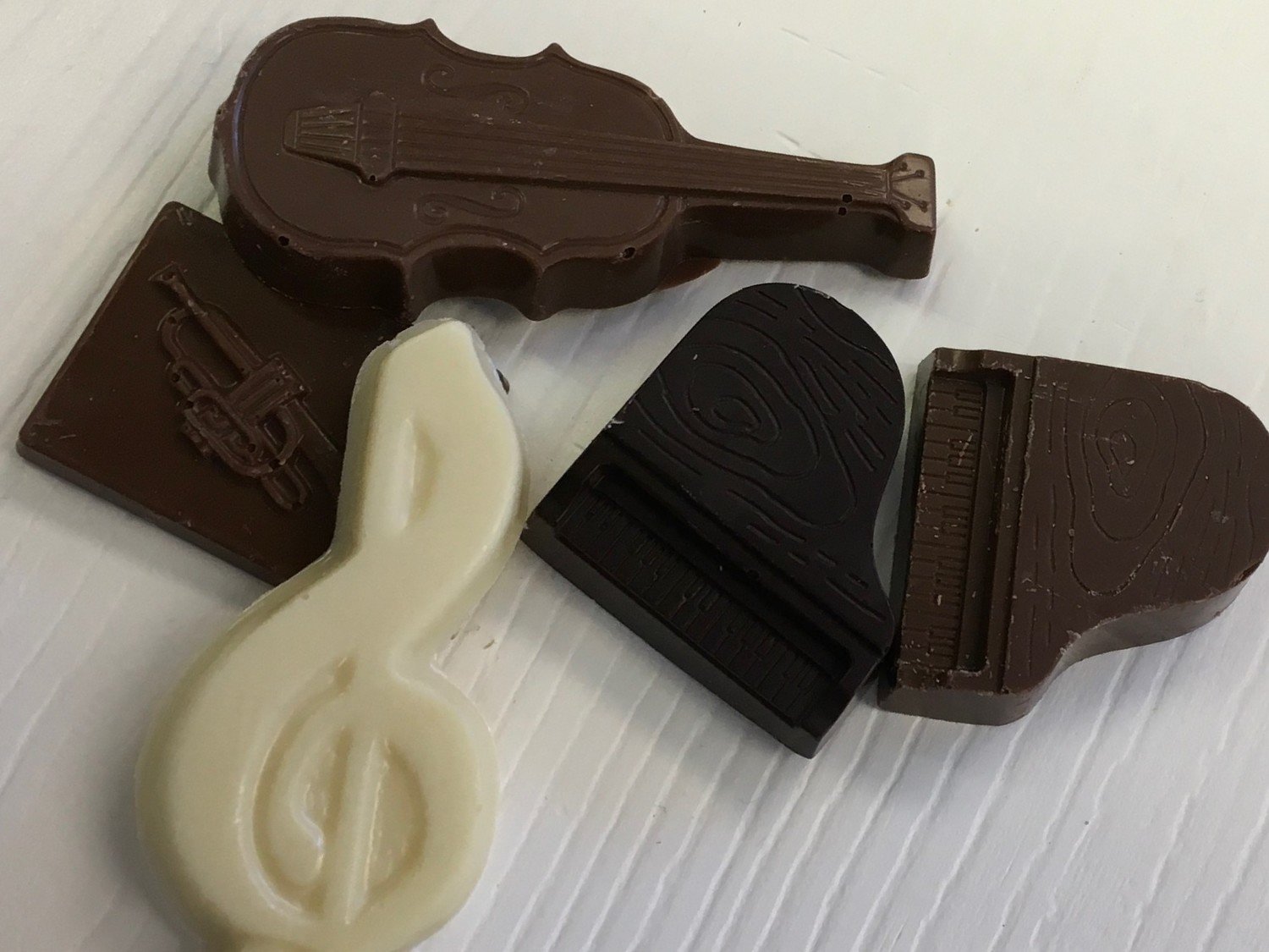 Mixture of Milk, Dark and White Musical Insruments.  Solid Chocolates.