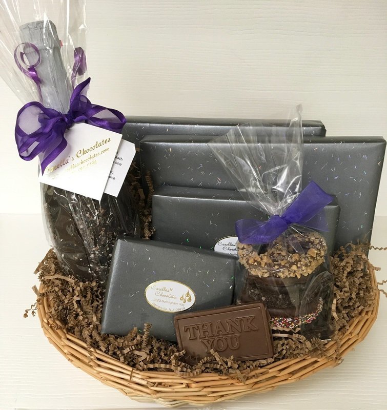 Carella's Chocolates Gift Basket.  Included Choc Covered Sparkling Cider, Gourmet Pretzels, Mini Pretzels, Truffles, Nuts and Asst. Chocolates.  Choc Bar optional.