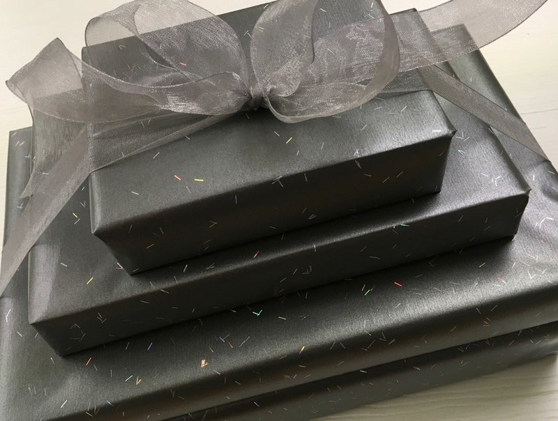 4 Tier Chocolate Supreme.  2 lb Asst. Chocolates, 1 lb Truffles, 1/2 lb Hard &amp; Chewey, 1/3 lb Nonpariels Mixed. Wrapping Included