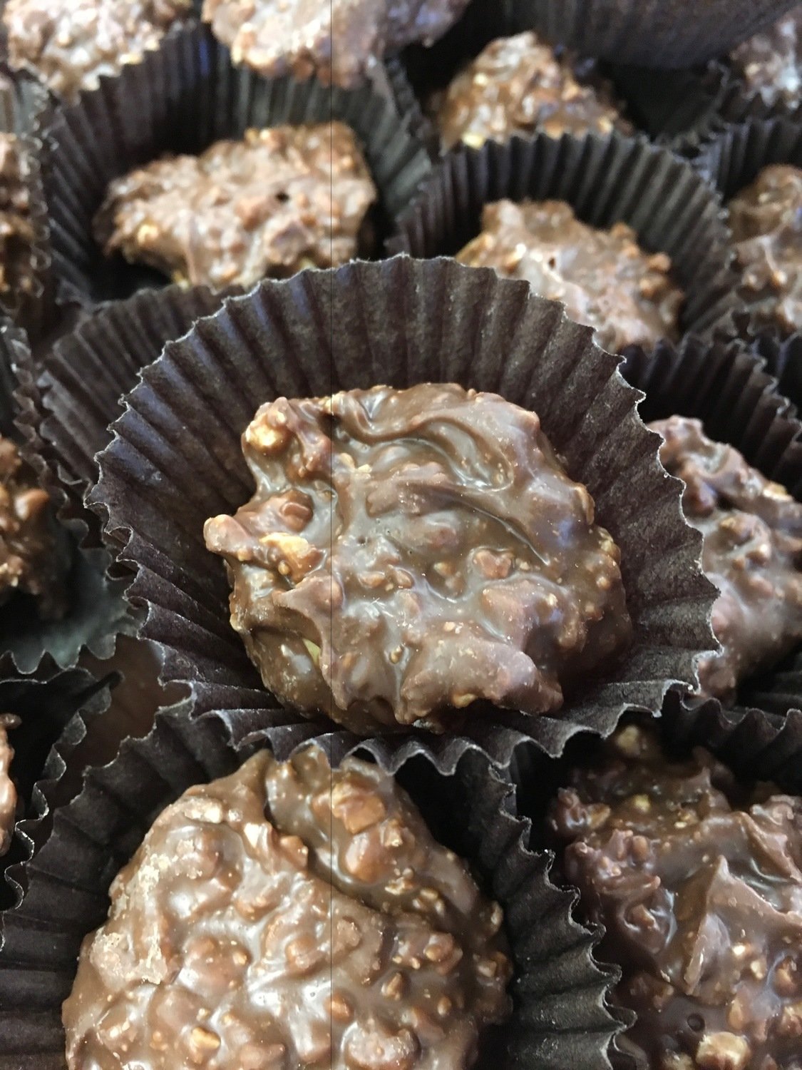 Almond Clusters.  Available in Milk Chocolate Only.