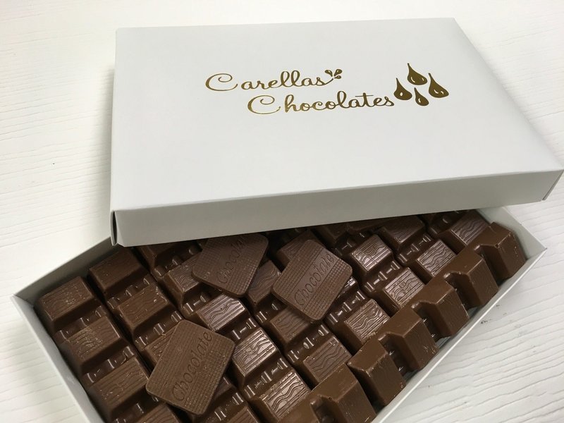 Carella's Chocolates Solid Chocolates Available Milk or Dark.  Peanut and Gluten Free.