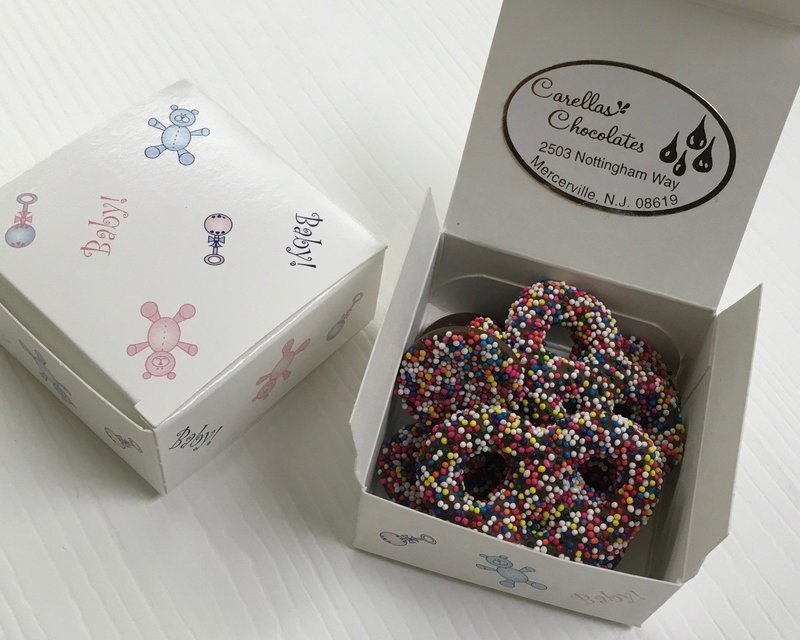 Baby Favors with 2 Milk Choc Mini Nonpariel pretzels and 6 Milk Choc Nonpariels.