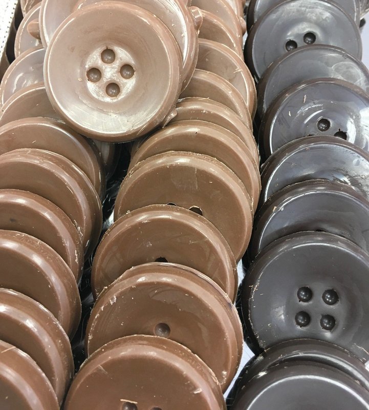 Solid Chocolate Buttons.  1 3/4" approx.  Peanut and Gluten Free.  36 to a Lb.