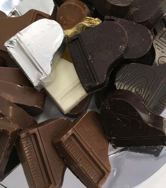 Solid Chocolate Pianos.  1 1/2" x 1 1/2" approx.  Peanut and Gluten Free.  28 to a Lb.