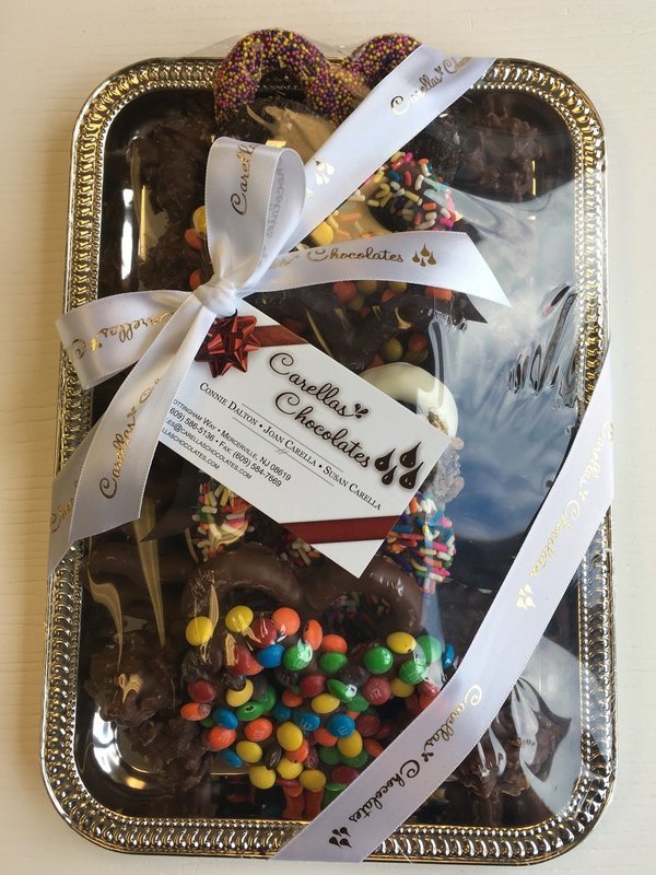 F - 1.5 Lb. Gourmet 3 Ring Pretzel Tray or 1.5 Lb. Most Popular Chocolates.