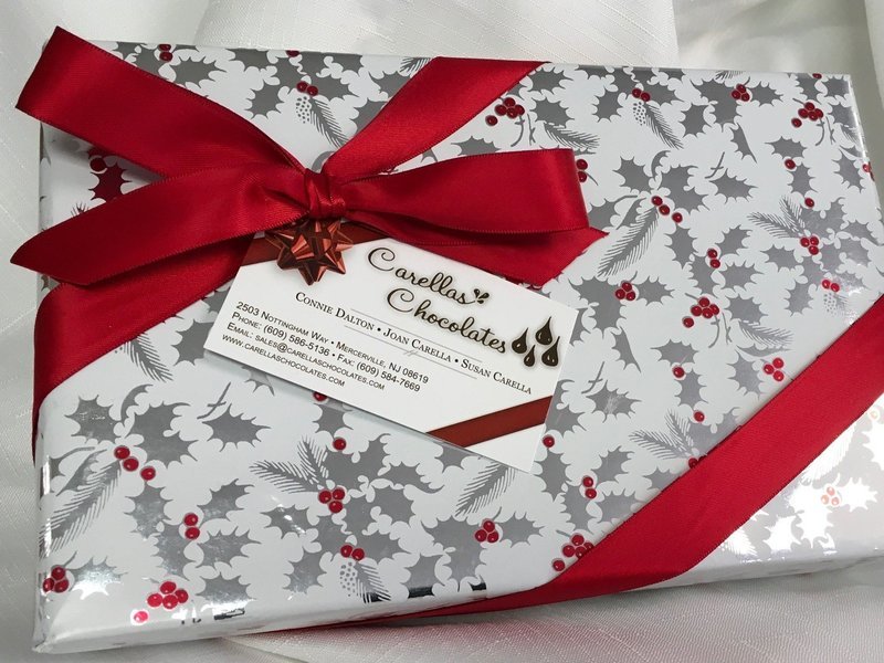 F - One Pound of Assorted Chocolates.  Choose from Several Chocolate Assortments.  Wrapped in Holiday Paper