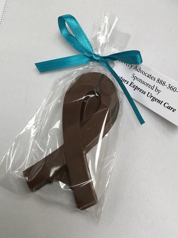 F - 25 4"x2" Favor Cancer Ribbon. Peanut and Gluten Free. Message us with Ribbon Color for your specific Cancer fundraiser. Personalized tag available. 10 day pre order F - 25 4"x2" Favor Cancer Ribbon. Peanut and Gluten Free. Message us with Ribbon Color for your specific Cancer fundraiser. Personalized tag available. 10 day pre order